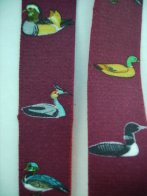 DUCK VARIETY BURGANDY 1 1/2"X48" Suspenders with 4 strong 1"x 1" Stainless Steel Grips and 2 Secure Stainless Steel Length Adjusters in the front. Entirely Stretchable Hand Washable and Hang to Dry Cotton/Polyester Material. UB220N48DVBU