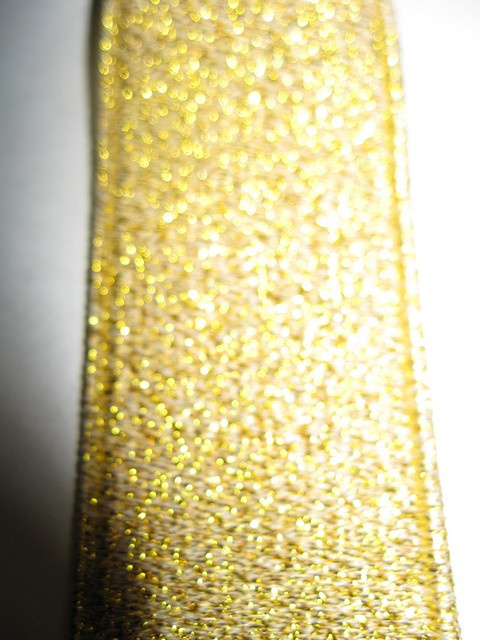 GOLD GLITTER "X" STYLE  1 1/4"X48" FRENCH SATIN FINISH Suspenders with 4 strong 1/2"x 1" Grips with nylon Teeth and 2 adjusters in the front and 1 on the back all in high polish GOLD FINISH.    GF760N48GOLD