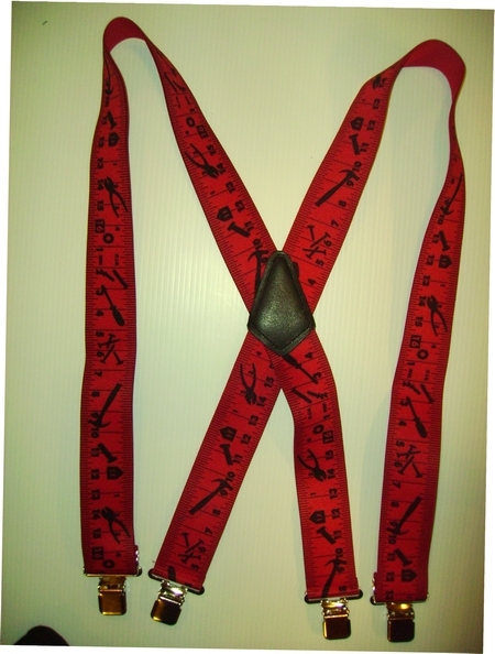 TAPE MEASURE 2"X48" with Black Markings and Red Background. Red with Black. Suspenders with 4 strong 1"x 1" Grips and 2 Length Adjusters in the front, all in NICKEL FINISH.   Entirely Stretchable Cotton/Polyester Material.         Entirely Stretchable Cotton/Polyester Material.         UA250N48TMRE
