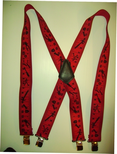 TAPE MEASURE 2"X48" with Black Markings and Red Background. Red with Black. Suspenders with 4 strong 1"x 1" Grips and 2 Length Adjusters in the front, all in NICKEL FINISH. Entirely Stretchable Cotton/Polyester Material. Entirely Stretchable Cotton/Polyester Material. UA250N48TMRE