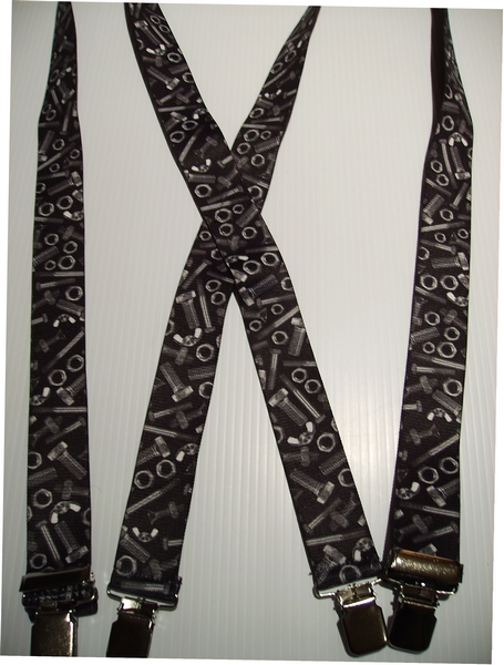 NUTS AND BOLTS  1 1/2"X54"   Black Color. Suspenders with 4 strong 1"x 1" Grips and 2 Length Adjusters in the front, all in NICKEL FINISH.   Entirely Stretchable Cotton/Polyester Material.         Entirely Stretchable Cotton/Polyester Material.           UB220N54NBBK