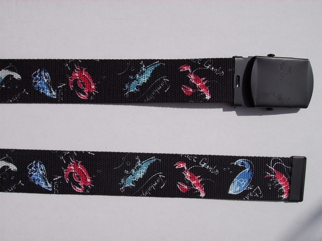 CAJUN ON BLACK BACKGROUND - High Quality U.S. Made Cotton/Polyester Non-Stretching Material with Solid Belt Buckle. These will fit all size waists from 8" up to 48" by un-clamping Buckle and cutting off extra material on non-metal end. Then just re-clamp Material. BELT-UB220N48CJBK