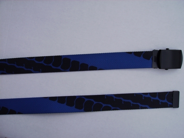 TIRE TREAD ROYAL BLUE - High Quality U.S. Made Cotton/Polyester Non-Stretching Material with Solid Belt Buckle. These will fit all size waists from 8" up to 48" by un-clamping Buckle and cutting off extra material on non-metal end. Then just re-clamp Material. BELT-UB220N48TTRO