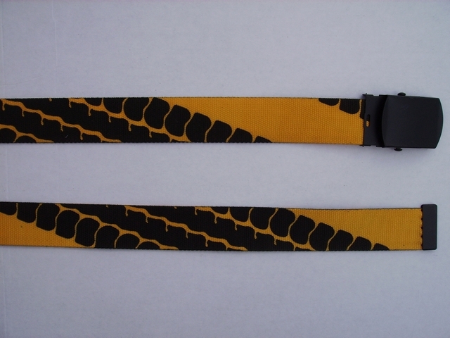 BLACK TIRE TRACKS ON GOLD - High Quality U.S. Made Cotton/Polyester Non-Stretching Material with Solid Belt Buckle. These will fit all size waists from 8" up to 48" by un-clamping Buckle and cutting off extra material on non-metal end. Then just re-clamp Material. BELT-UA220N48TTYE