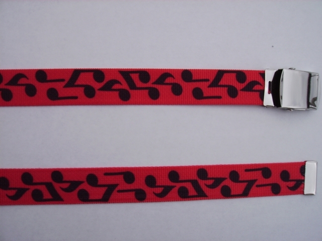 BLACK MUSICAL NOTES ON RED - High Quality U.S. Made Cotton/Polyester Non-Stretching Material with Solid Belt Buckle. These Belts Are Sold by Us Wholesale in Large Quantities, to Name Brand Stores and They Resell Them at Premium Prices. These will fit it will fit All Size Waists from 8" up to 48" by Un-Clamping Buckle and Cutting Off Extra Material on Non-Metal End. Then Just Re-Clamp Material. BELT-UA220N48BNRE