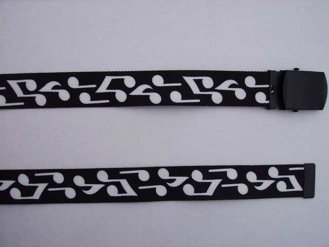 WHITE NOTES ON BLACK - High Quality U.S. Made Cotton/Polyester Non-Stretching Material with Solid Belt Buckle. These will fit all size waists from 8" up to 48" by un-clamping Buckle and cutting off extra material on non-metal end. Then just re-clamp Material. BELT-UA220N48BNBK