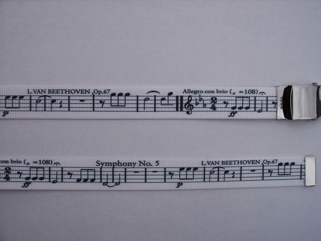 BLACK MUSIC SCORE ON WHITE - High Quality U.S. Made Cotton/Polyester Non-Stretching Material with Solid Belt Buckle. These will fit all size waists from 8" up to 48" by un-clamping Buckle and cutting off extra material on non-metal end. Then just re-clamp Material. BELT-UA220N48MUWH