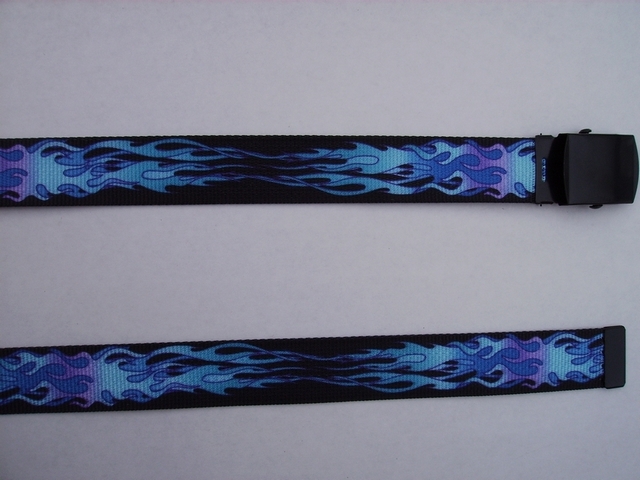 BLUE FLAMES ON BLACK - High Quality U.S. Made Cotton/Polyester Non-Stretching Material with Solid Belt Buckle. These Belts Are Sold by Us Wholesale in Large Quantities, to Name Brand Stores and Thye Resell Them at Premium Prices. These will fit it will fit All Size Waists from 8" up to 48" by Un-Clamping Buckle and Cutting Off Extra Material on Non-Metal End. Then Just Re-Clamp Material. BELT-UA220N48FLBL