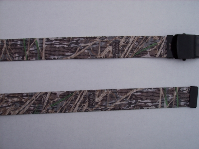 LICENSED CAMOUFLAGE SHADOW GRASS - High Quality U.S. Made Cotton/Polyester Non-Stretching Material with Solid Belt Buckle. These will fit all size waists from 8" up to 48" by un-clamping Buckle and cutting off extra material on non-metal end. Then just re-clamp Material. BELT-UA250K48SHAD