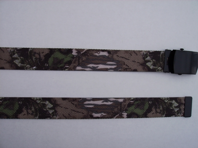 LICENSED CAMOUFLAGE BREAKUP - High Quality U.S. Made Cotton/Polyester Non-Stretching Material with Solid Belt Buckle. These will fit all size waists from 8" up to 48" by un-clamping Buckle and cutting off extra material on non-metal end. Then just re-clamp Material. BELT-UA260K48BREA