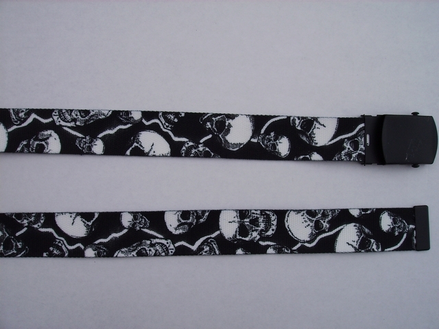 SKULLS WITH LIGHTNING BOLTS - High Quality U.S. Made Cotton/Polyester Non-Stretching Material with Solid Belt Buckle. These will fit all size waists from 8" up to 48" by un-clamping Buckle and cutting off extra material on non-metal end. Then just re-clamp Material. BELT-UB220K48LIGH
