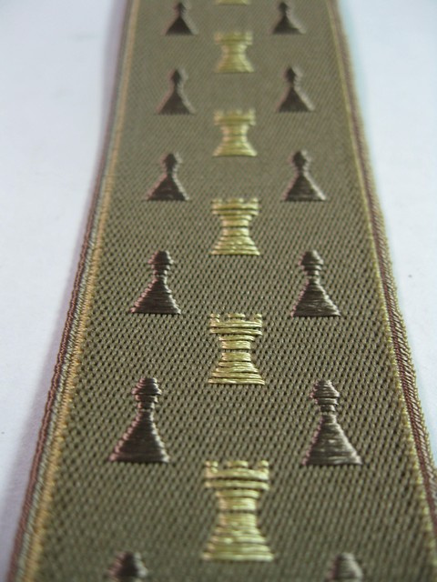 1 1/2" wide. "Y" Style. Assorted SIZES from 5' 1" to  7' 4" Height. (42" to 60" long Straps) Deluxe Suspenders-Cotton/Polyester Hand Washable-Hang To Dry Material With Gold Grips And Adjusters. Chess Pieces- Gold Rooks, Brown Pawns On Dark Tan Background With Gold Edges.    Y-CHS76B-#110